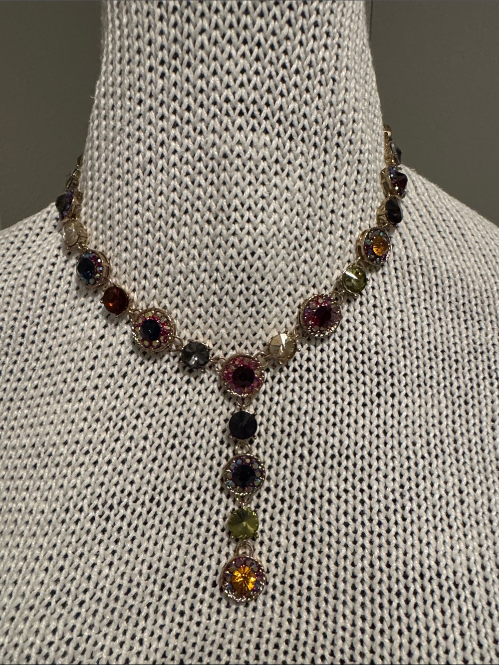 Multicolor crystal gold hardware center drop adjustable statement necklace.